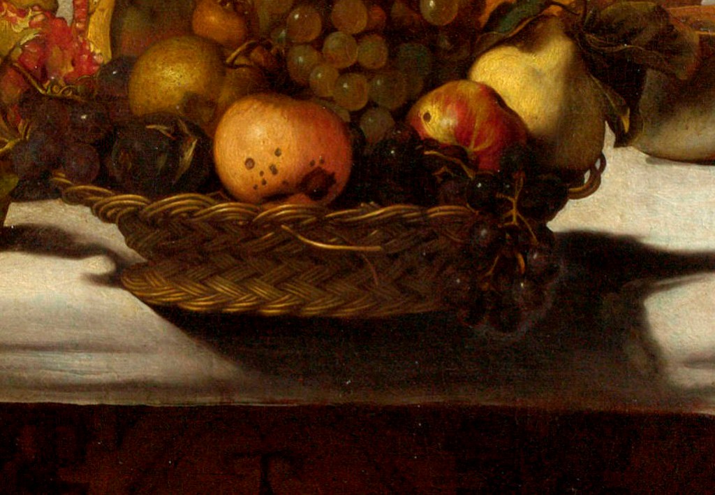 Ve střední části košíku s ovocem je dvojicí vyčnívajících prutů vytvořen zřetelný symbol ryby v liniích prvními křesťany používaného tajného znaku ichtys. Celá staletí byl tento motiv nerozpoznán. Zdroj  obrázku  pro výřez: Caravaggio, Public domain, via Wikimedia Commons

